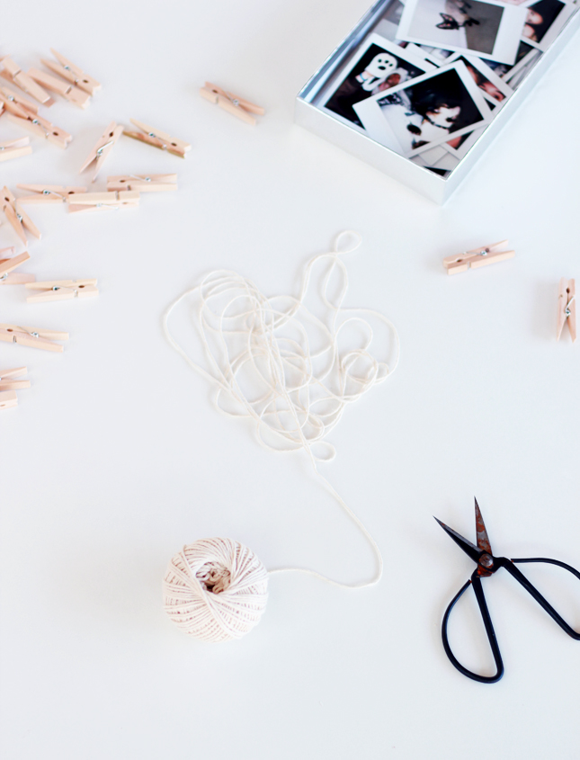 5 Minute DIY | Interchangeable photo garland (via www.highwallsblog.com)