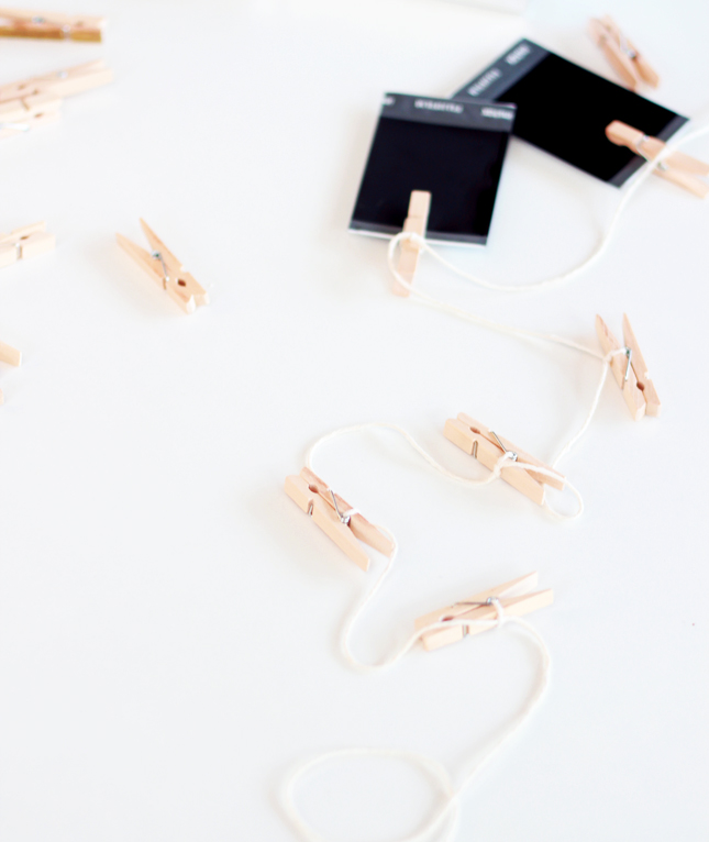 5 Minute DIY | Interchangeable photo garland (via www.highwallsblog.com)