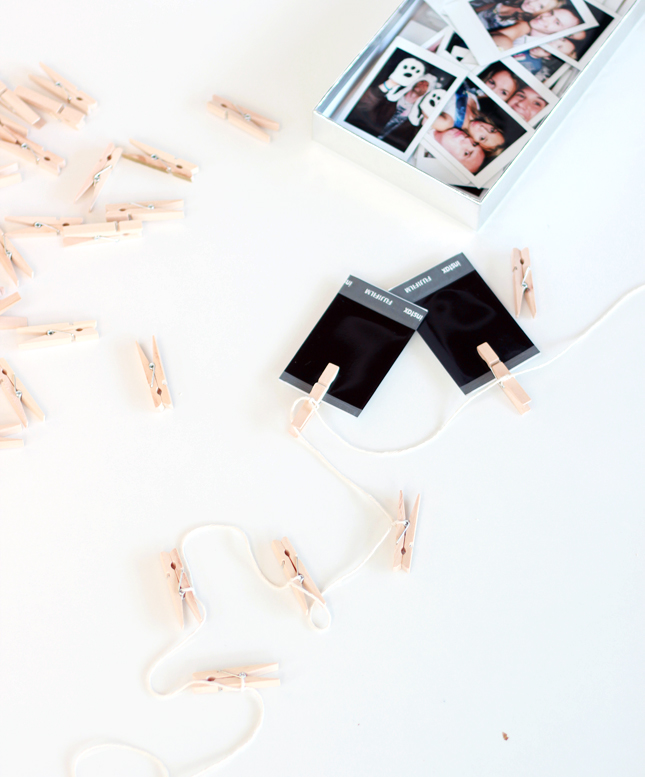 5 Minute DIY | Interchangeable photo garland (via www.highwallsblog.com)
