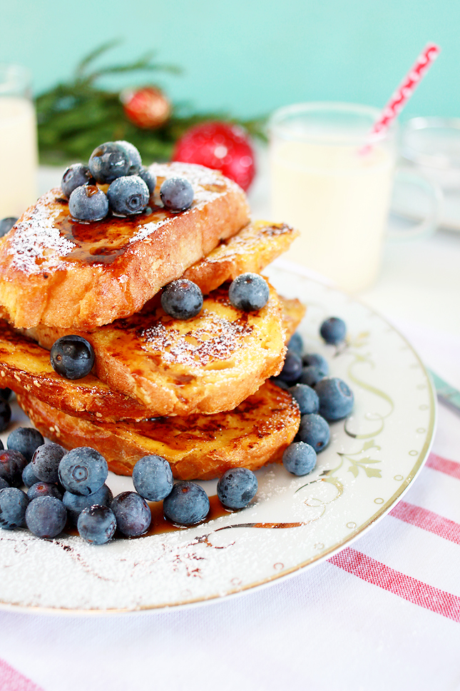 Enjoy a festive breakfast the RIGHT way, with a big helping of  Eggnog French Toast! (Click through for the full recipe)