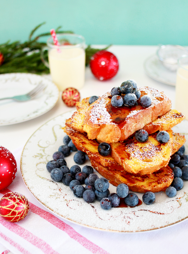 Enjoy a festive breakfast the RIGHT way, with a big helping of  Eggnog French Toast! (Click through for the full recipe)
