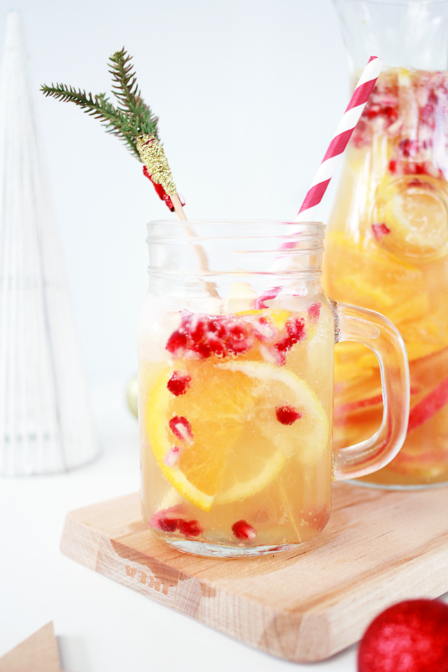 Get boozy on Christmas Day with some  Apple Cider White Sangria - it's just fancy punch!