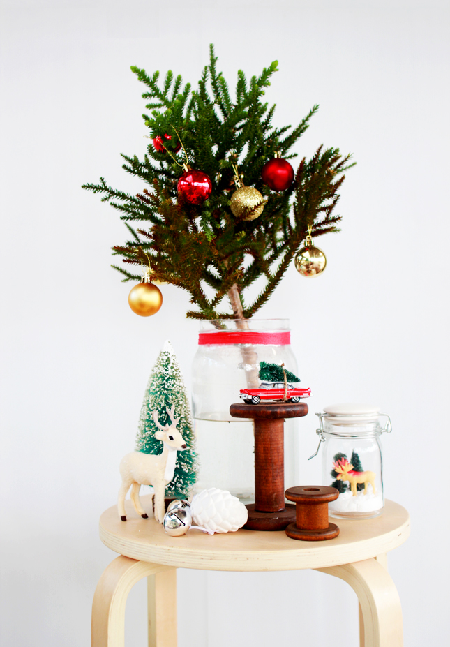 Short on space this Christmas? Can't fit a full sized tree? Why not make a pretty Christmas themed display instead? (Your presents need somewhere to live leading up to the big day!)